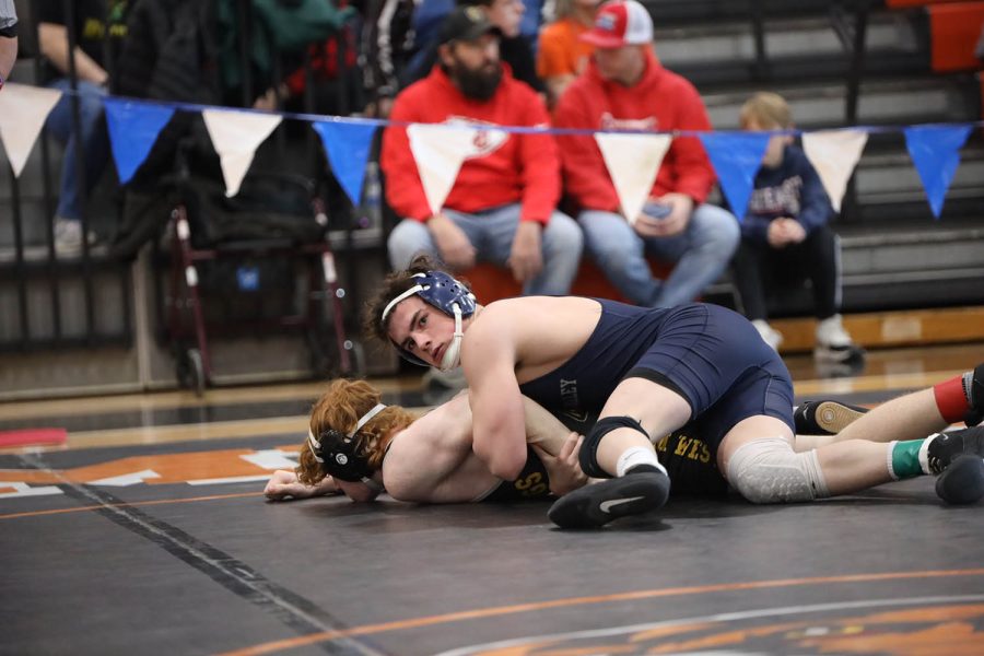 Looking toward his coach, junior Maddox Casella tries to figure out what to do next. 