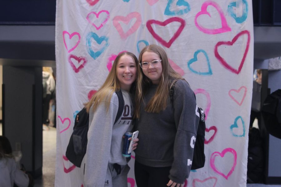 Juniors Anna Roche and Reagan Enemark come together for a picture.