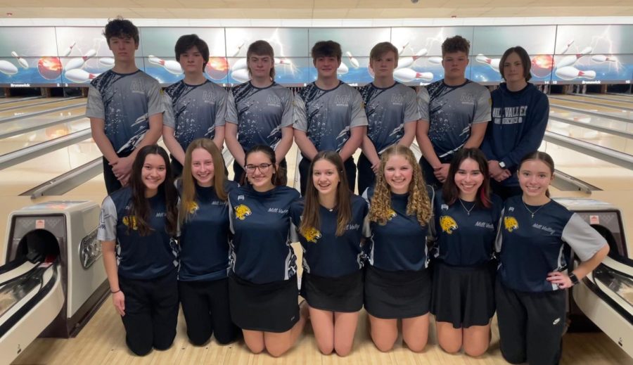 The boys and girls varsity bowling teams gather for a photo after their successful day at regionals where they placed third and second overall. Both teams advanced to state on March 3 in Wichita.