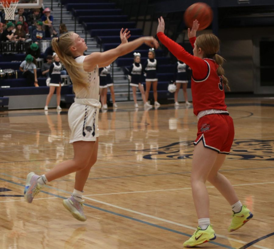 Senior Sophie Pringle passes the ball to a teammate.