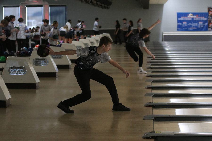 Freshman Chase Jackson focuses on the lane to knock as many pins down. 