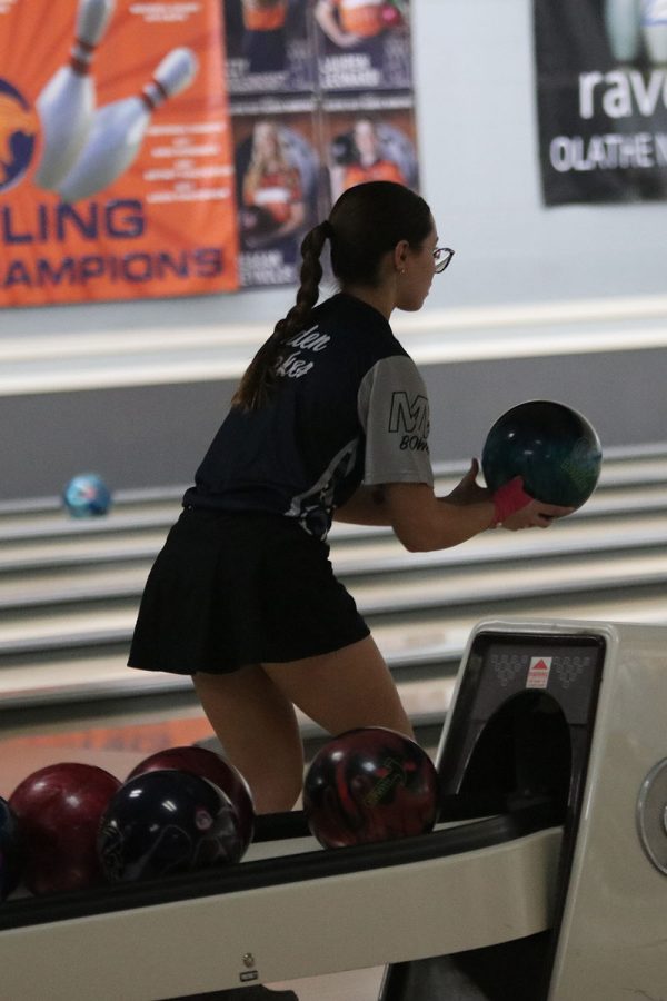 Senior Eden Hakes prepares her form before rolling the ball down the lane. 