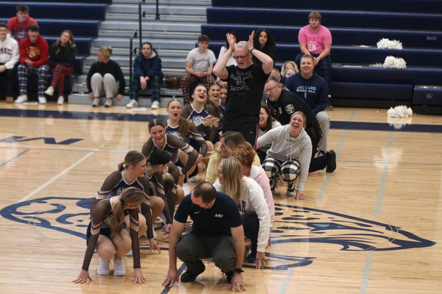 Science teacher Chad Brown poses at the beginning of the dance the Silver Stars shared with the teachers. 