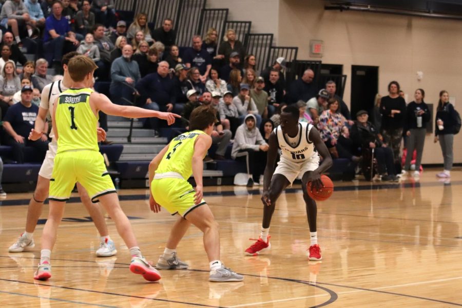 Eyeing a defender, senior Nen Matlock looks for his next move. 