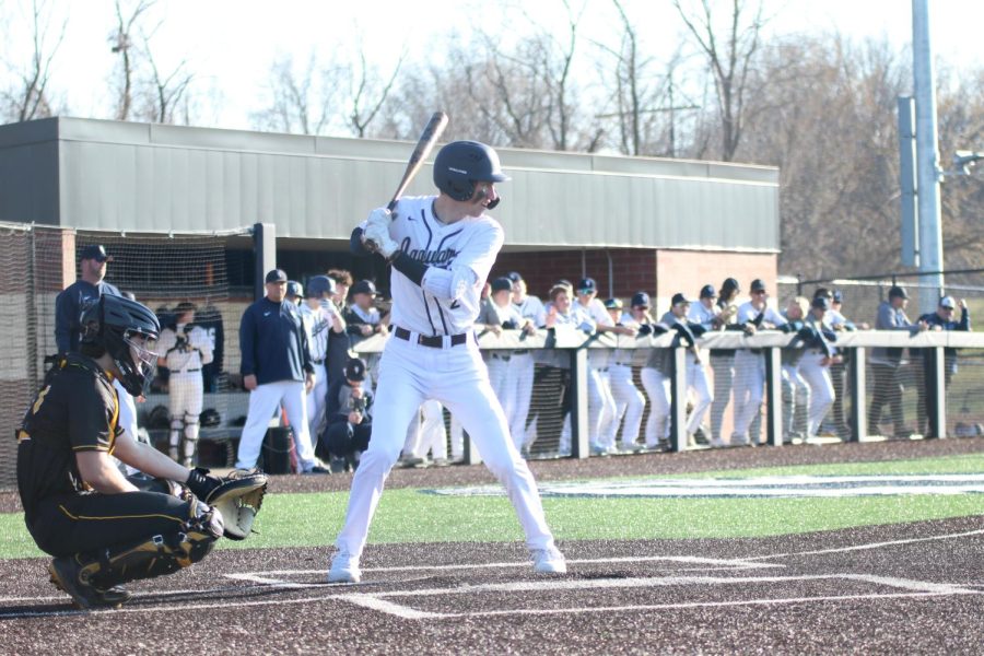 Senior Brooks Jahnke stands ready to bat as he waits for the pitcher.