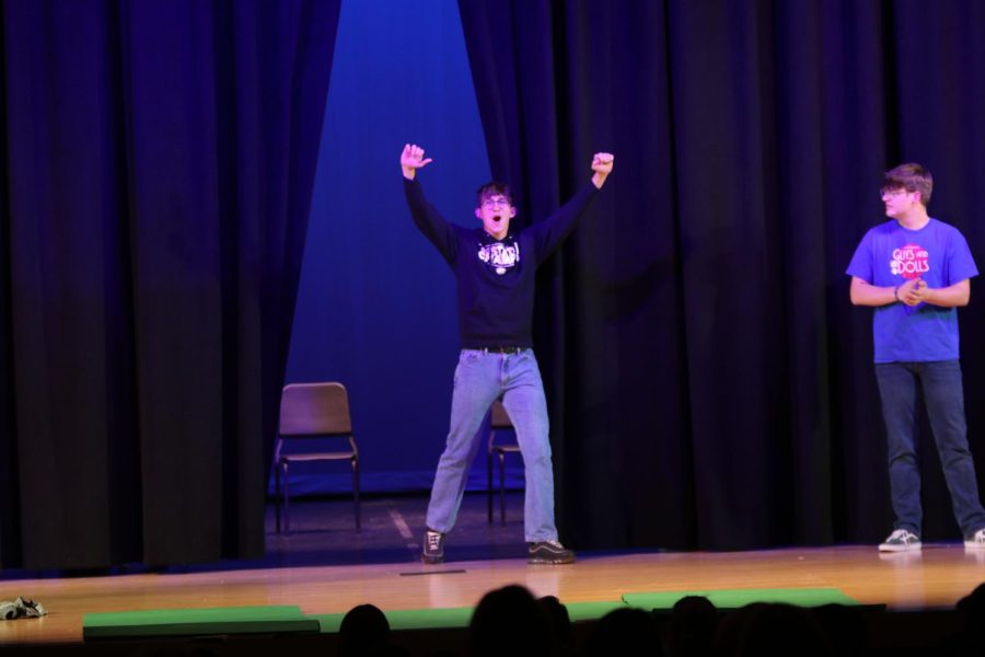 Being introduced as Mr. Spirit, senior Max Weber throws his hands in the air as he enters the stage.