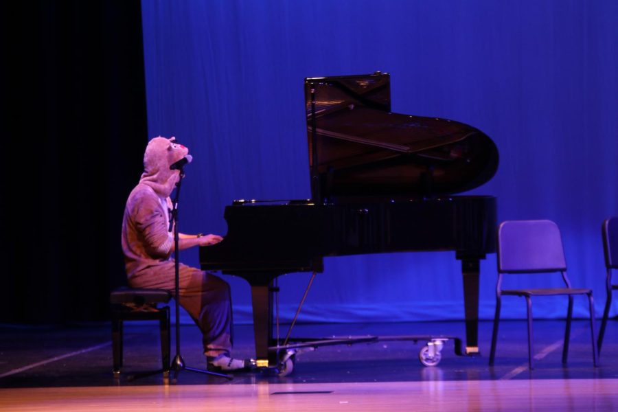 To show off his talent, junior AJ Lauer performs a piano solo.