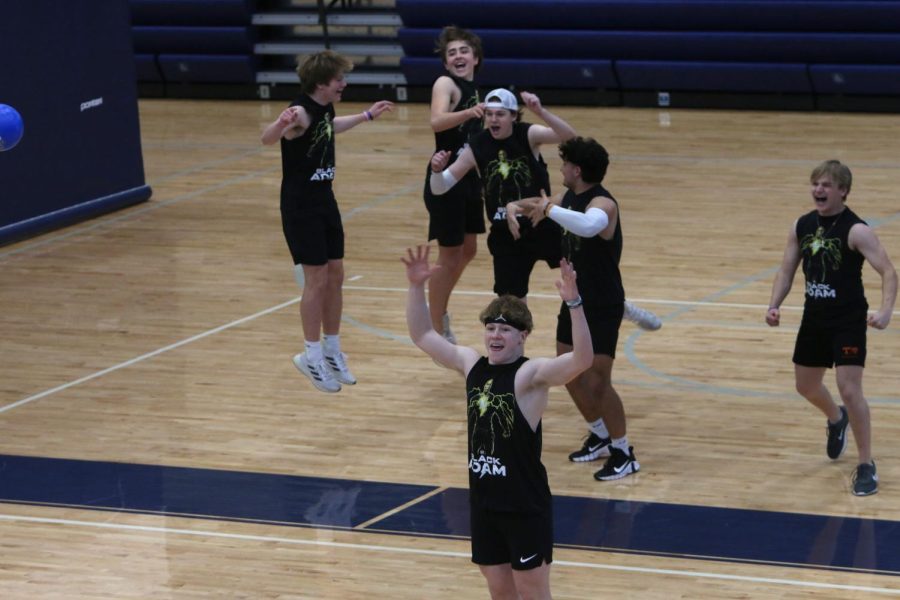 The Tyrannosaurus Rexs celebrate advancing to the championship game.