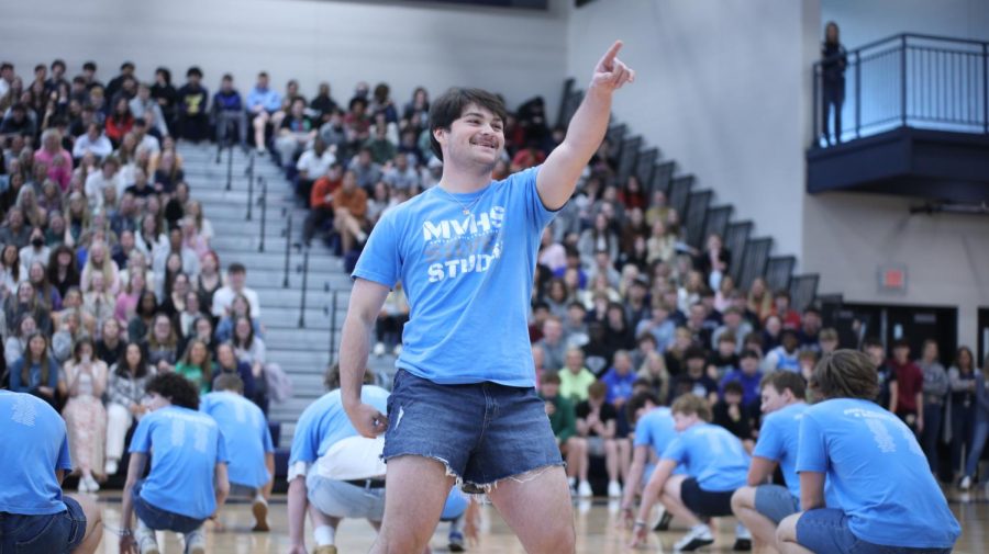 During his solo, senior Parker Volski points to the crowd.  