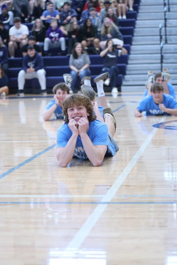 While dancing during the Silver Studs performance, senior Toby Kornis smiles big.