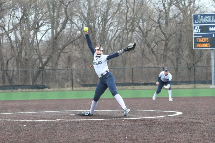 Focused on her target, junior Brooklyn LaFon pitches a strike. 
