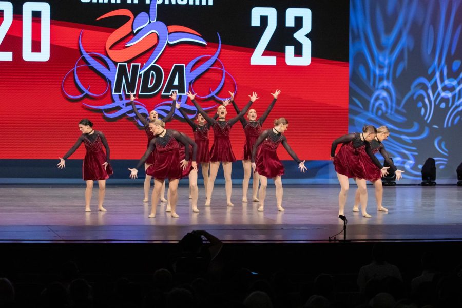 With passionate movements and expressive faces, the Silver Stars complete their small varsity Jazz division routine.