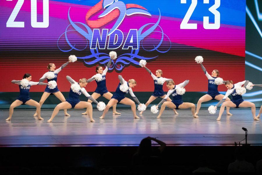 In near perfect synchronization, the Silver Stars execute their highly technical Pom division routine.