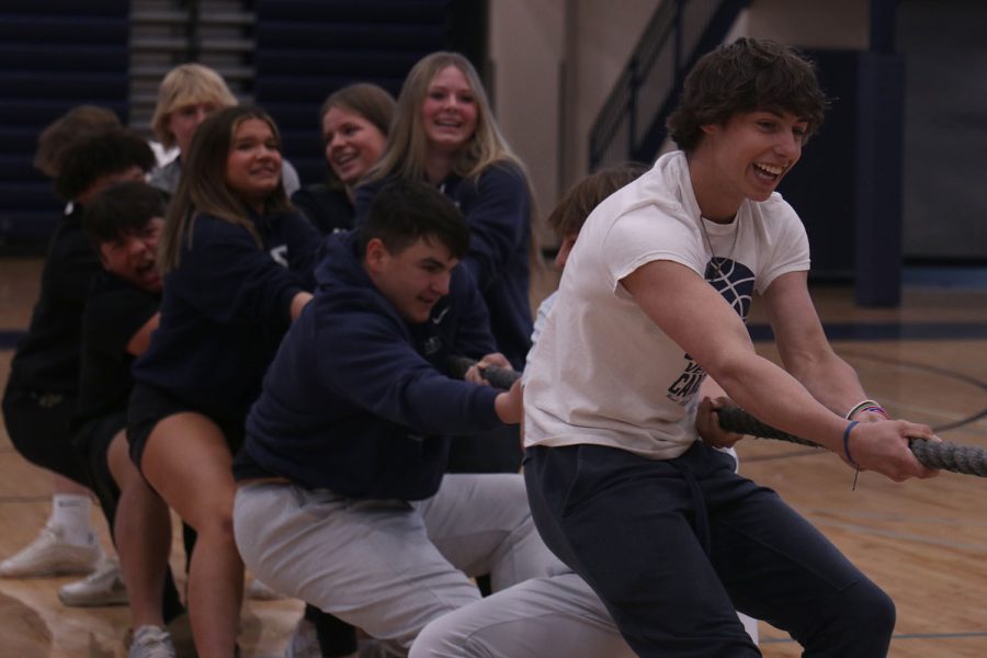 With a big smile on his face, freshman Blake Jay participates in the tug of war competition.