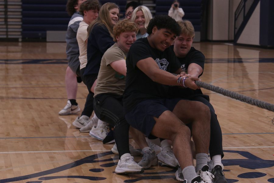 At the front of the rope, sophomore Jayden Woods focuses so he can win the round of tug of war.