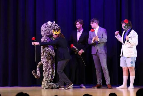 After being crowned Mr. Mill Valley, senior Jameson Beran runs to hug JJ Wednesday, March 29. 
