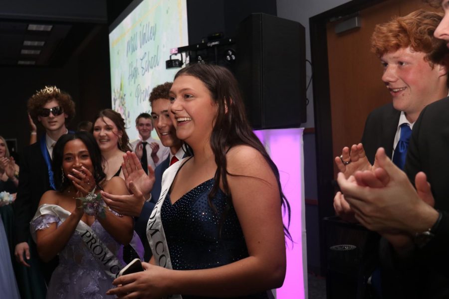 Being recognized as prom queen, senior Hayden Rider smiles.