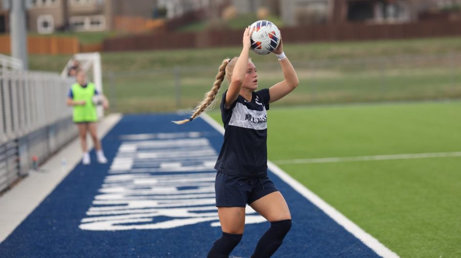Senior Sophie Pringle gets ready to throw the ball in to her teammate. 