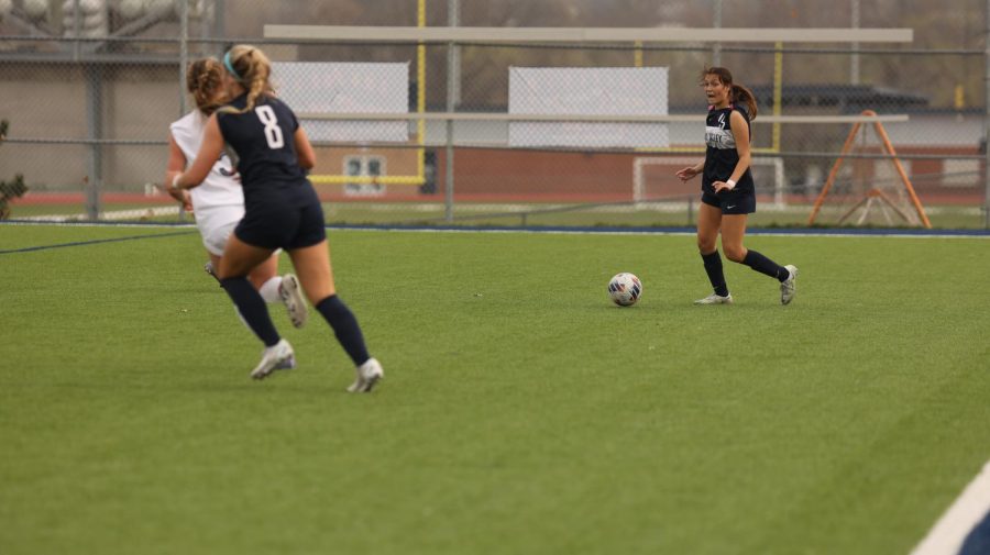 Junior Shelby Kindt yells at her teammates to get open for her.