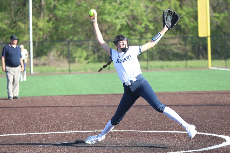 Building momentum, sophomore Ashlyn Blazer pitches the ball.