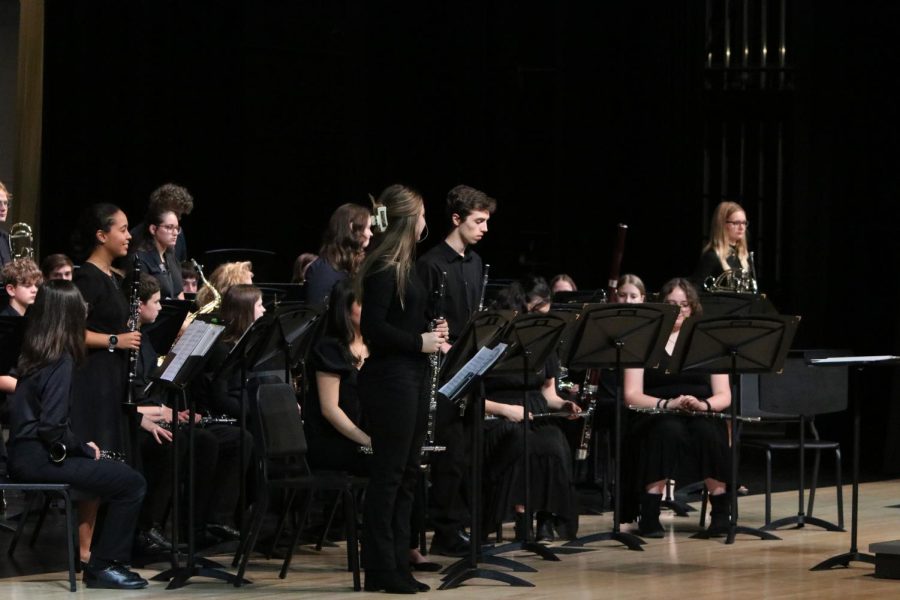 Members of the symphonic band stand to get recognized for their lettering. 