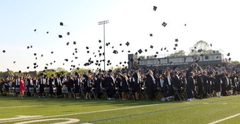 To conclude the graduation ceremony, seniors throw up their caps in celebration. 