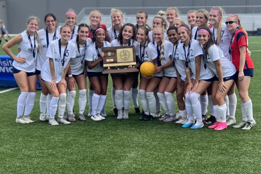 Fresh from their 3-0 6A state title win over Shawnee Mission East Saturday, May 27, the girls soccer team poses for their team photo. The win was the first state soccer title in school history.
