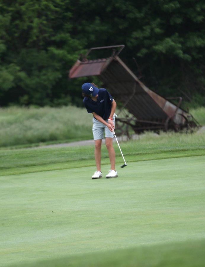 Sophomore Brett Spandett watches the ball.
