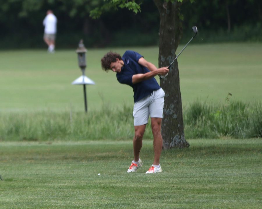 Junior Broden Resch finishes his swing.
