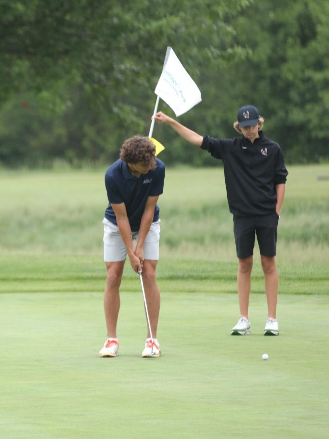 Junior Broden Resch watches the ball roll.
