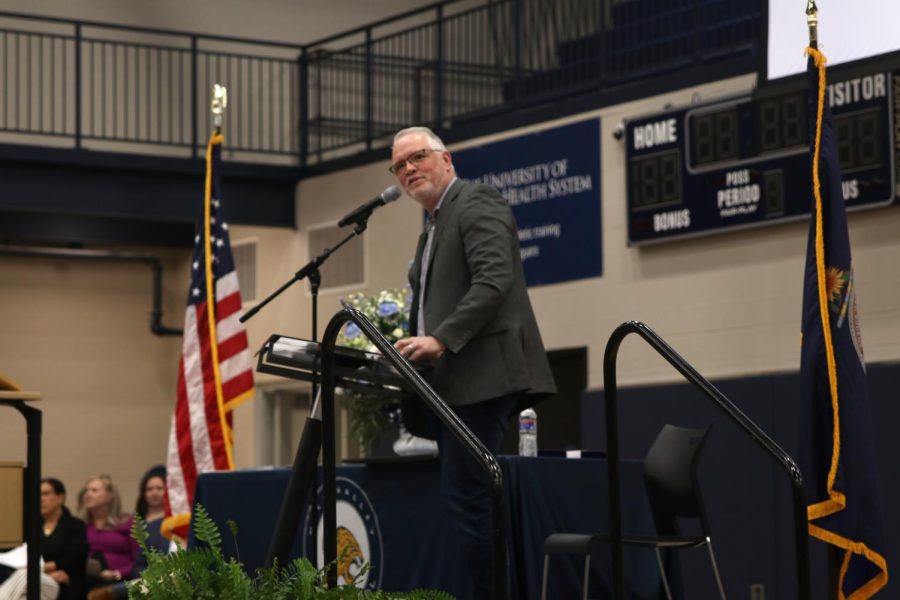 Science teacher Chad Brown addresses the class of 2023 at the beginning of the Senior Award Ceremony.