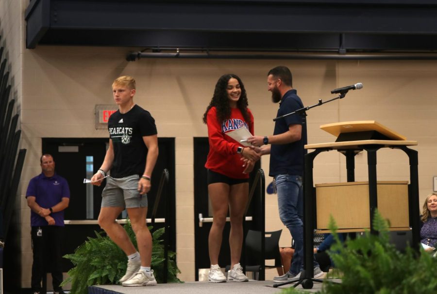 Seniors Holden Zigmant and Olivia Page receive the Mill Valley Distinguished Athlete Award.

