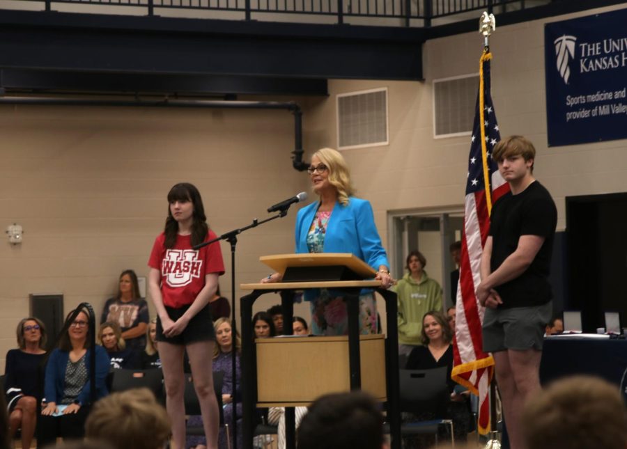 Dr. Holder presents the Valedictorian award to senior Dalton Gabbert and the Salutatorian award to senior Sarah Johnston.