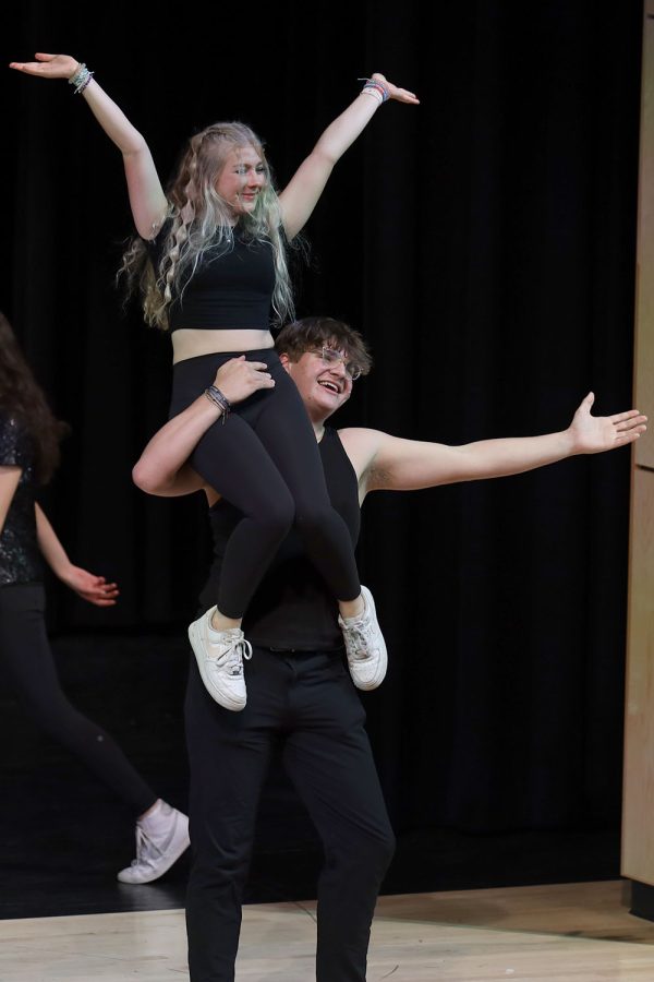 During the song “Magic to Do” from Pippin, junior Blake Powers holds up junior Violet Hentges on his shoulder.