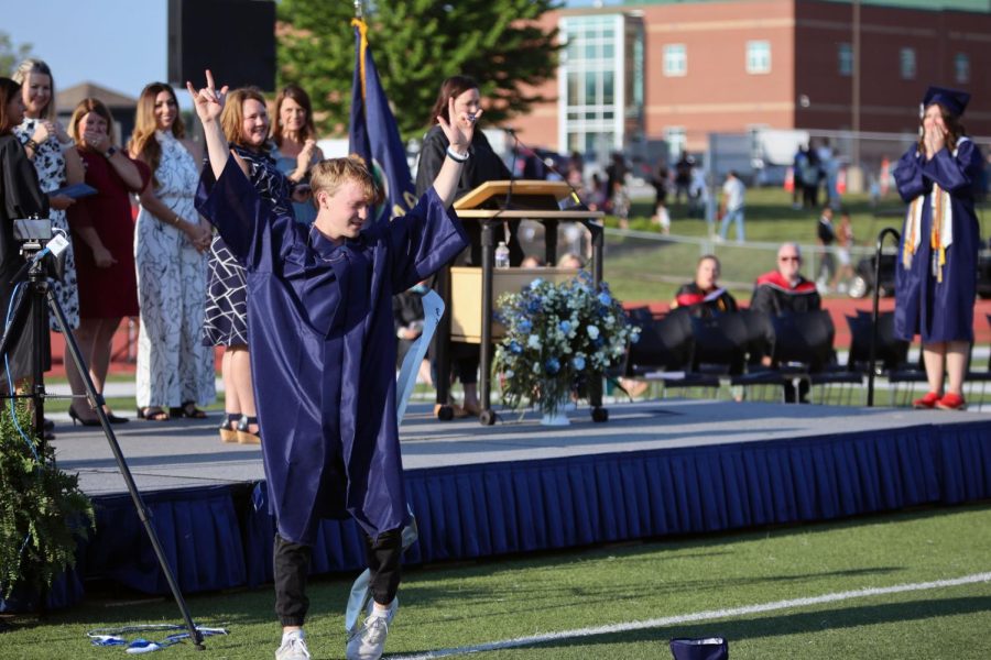 After falling off the stage attempting to do a cartwheel, senior Matt Morgan poses. 
