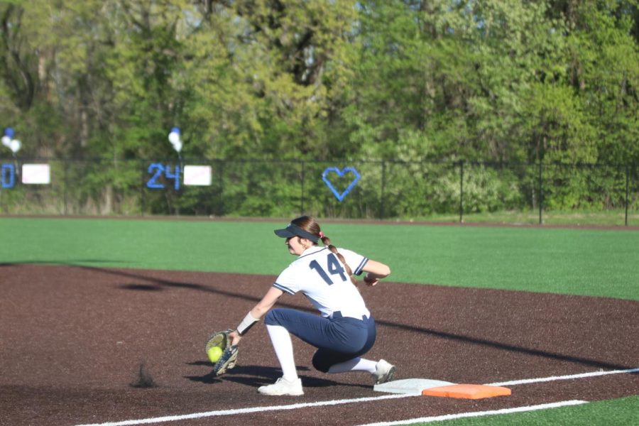 Stopping the ball, senior Annalise Stottlemyre gets the out at first base.