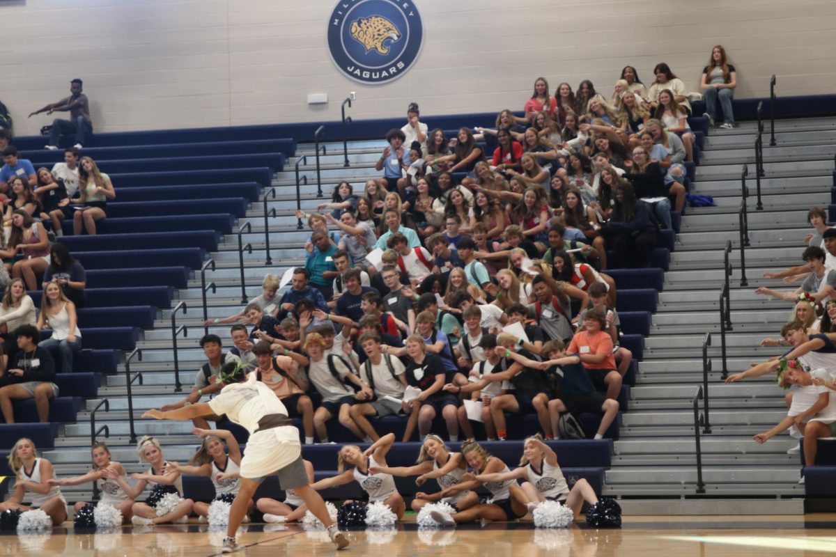 Student Council leads the wave at the welcoming pep assembly.