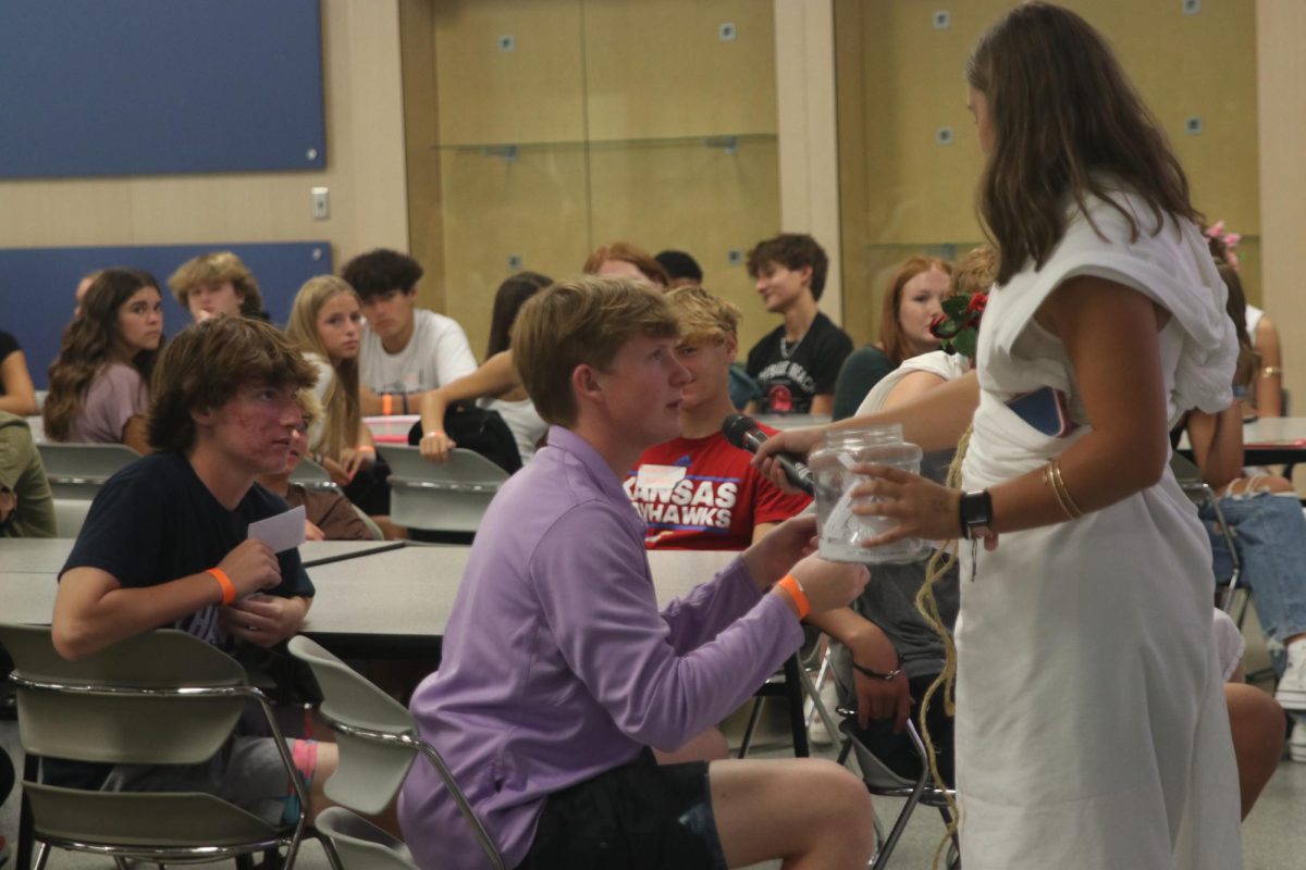 A freshman reads a question aloud during the Q&A portion of the rotation.