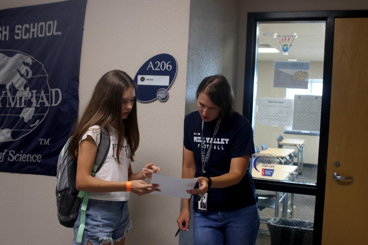 Social Studies teacher Melissa Weber meets her new student.