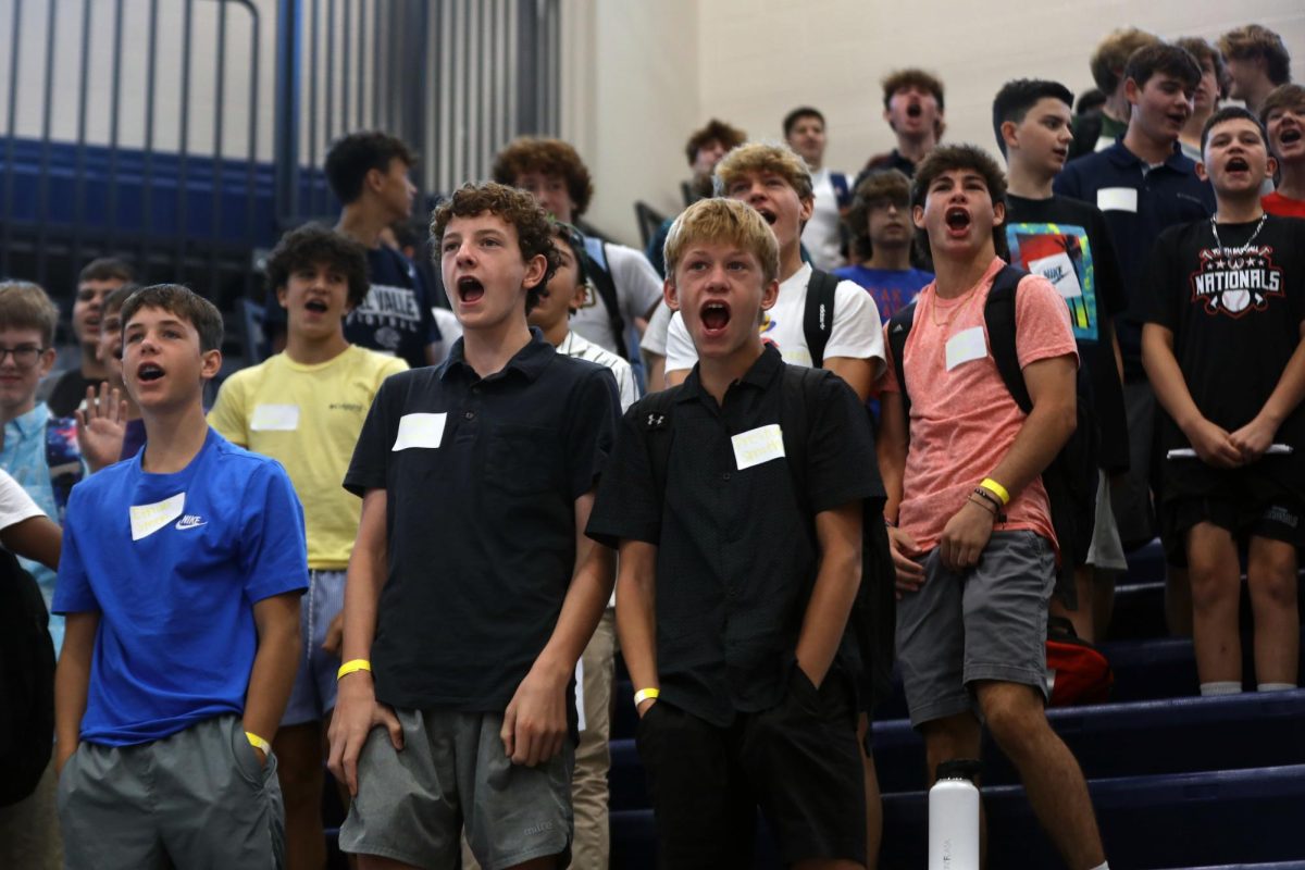 After learning the new chant, freshmen in the crowd yell the words to Lets go jags.