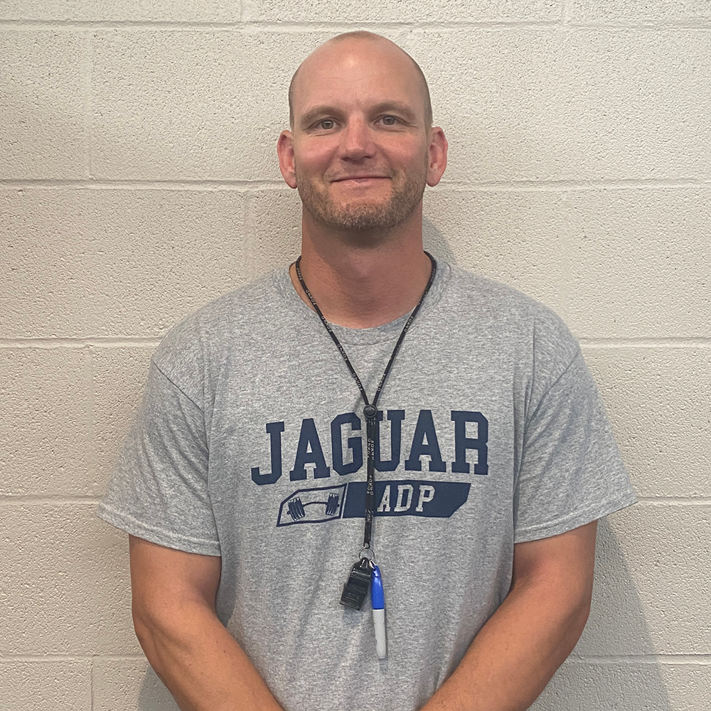 PE teacher Jamie Resseguie stands with his whistle Thursday, Sep. 7. [It’s an] important tool that I use, a very simplistic piece, Resseguie said.