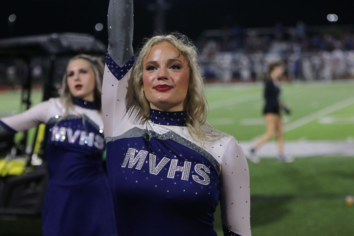 Senior Trinity Baker jumps back into uniform after being a homecoming candidate at half time