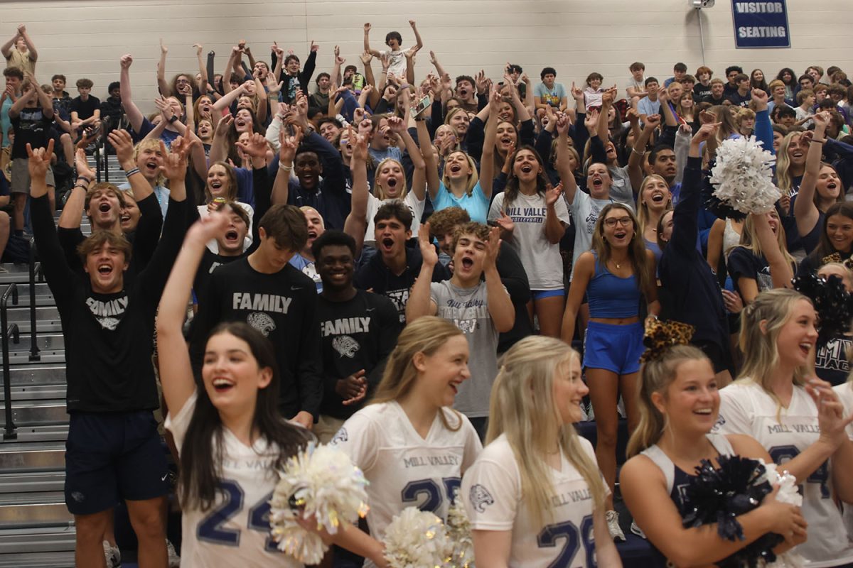 The senior section cheers after winning the “Hey Hey, What do you say” chant competition at the end of the assembly.