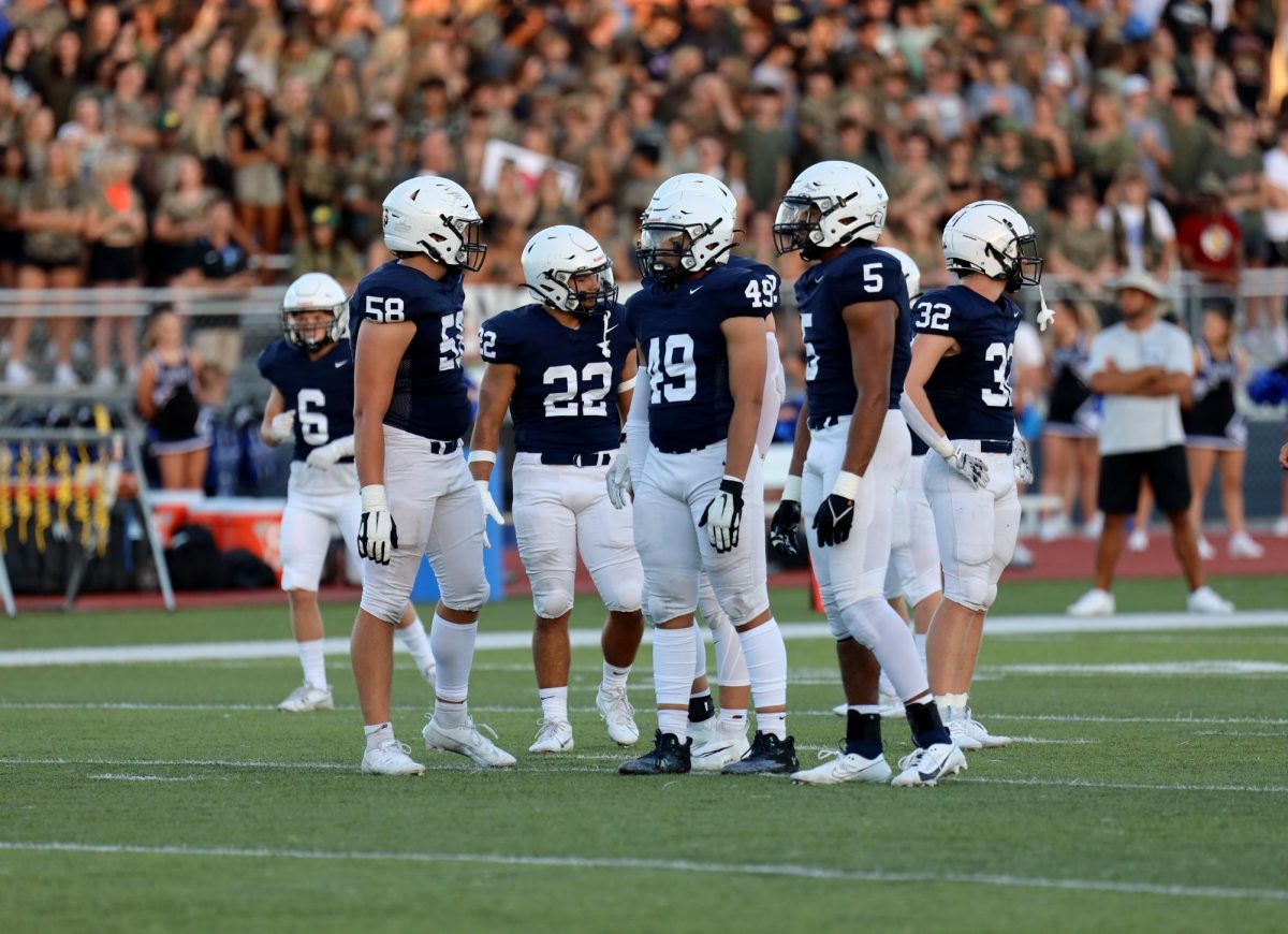 After the play, the team gets together to regroup.