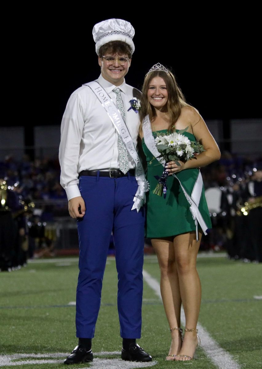 After Homecoming king Blake Powers and queen Lucy Roy are announced, the seniors pose for a picture.