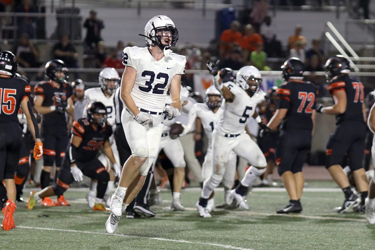 Junior Garret Clark celebrates after a play.