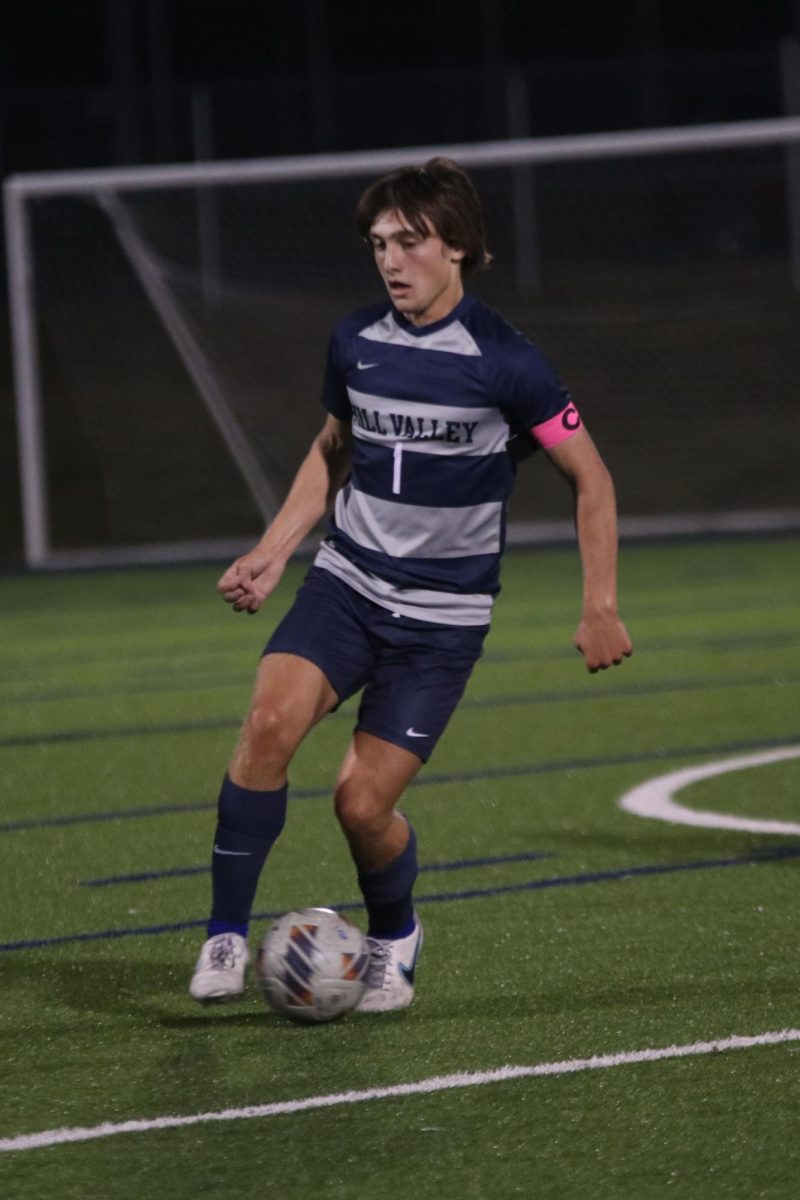 Senior Kael Drummond receives the ball during a game against Lawrence High School Thursday, Sept. 14. During the game, Drummond scored his fourth goal of the season.  