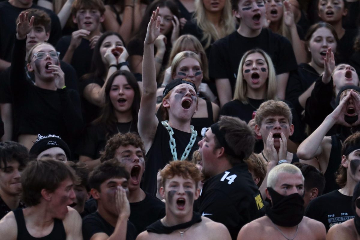 During the kickoff, senior Porter Slattery hypes up the crowd.