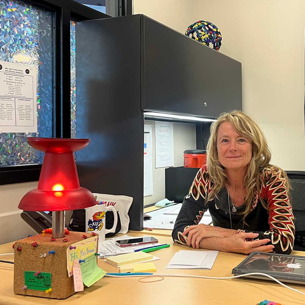 Gifted facilitator Michele Brown sits at her desk with her lamp Wednesday, Sep. 6. I walked by [the lamp] at Kohls years ago and Ive had it on my desk forever and its just that kids find it endlessly amusing, Brown said.