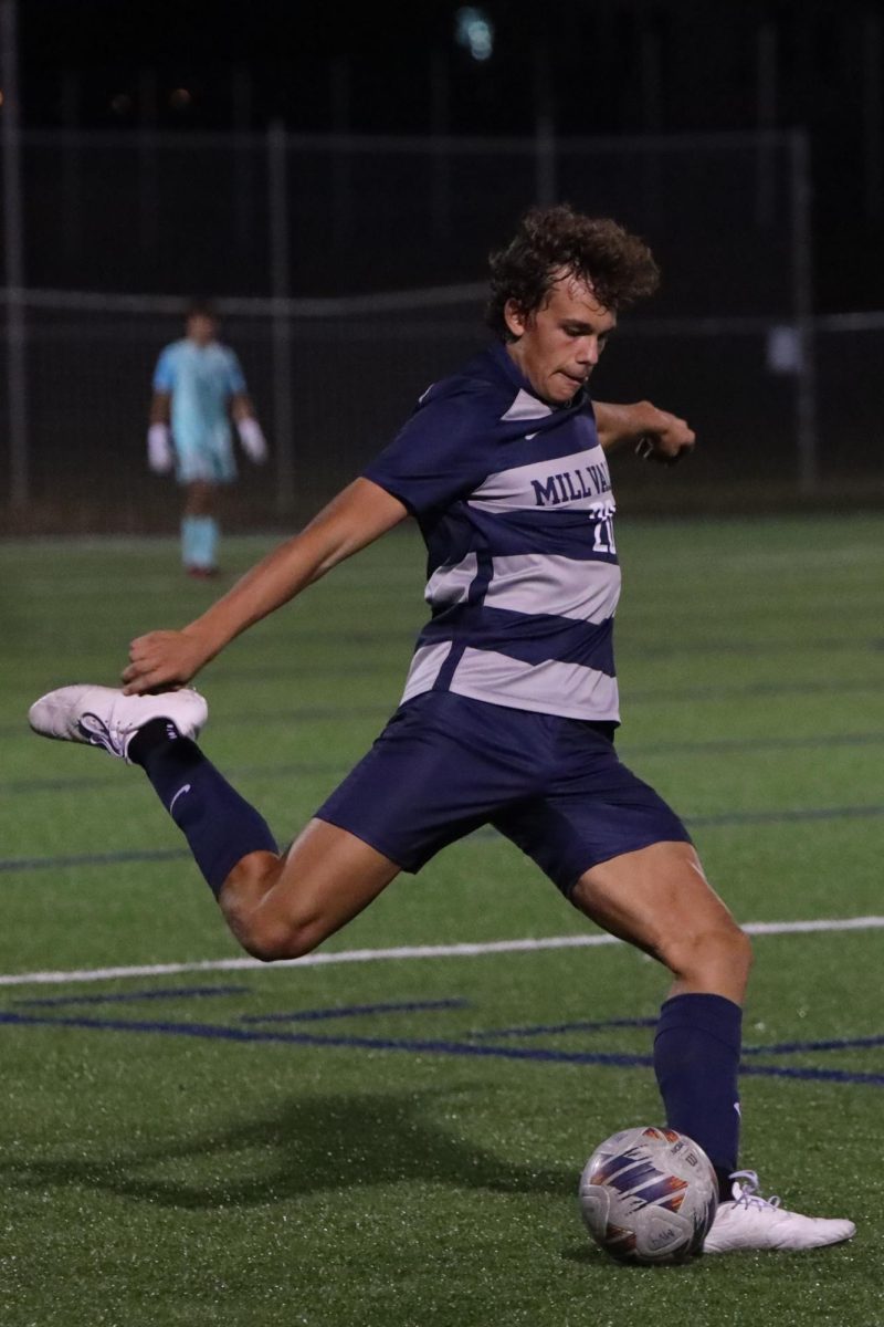 Broden Resch strikes the ball to switch the field.